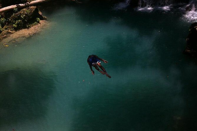 Blue Hole and Sightseeing Tour from Falmouth - Blue Hole: rope swing, cave exploring, and guided waterfall climbing