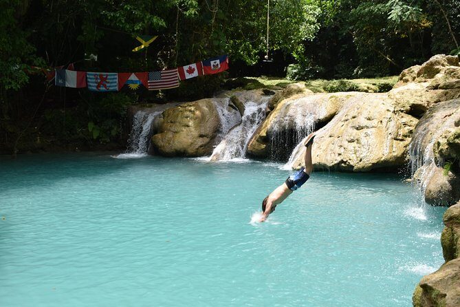 Blue Hole & Secret Falls Day Trip plus Shopping from Runaway Bay - Cool Blue Hole: turquoise water, rope swings, and real movement