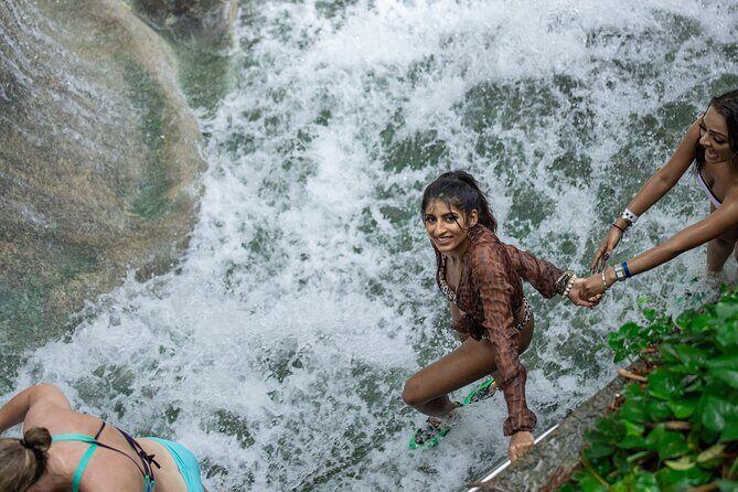Catamaran Cruise with Snorkeling and Dunn's River Falls - On-Board Rum Punch and Jamaican Music: The Party Side of Ocho Rios