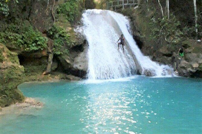Dunn's Falls and Blue Hole Daytrip with Lunch from Montego Bay & Trelawny - Blue Hole River Adventure park: waterfalls, rock pools, and swing-style fun
