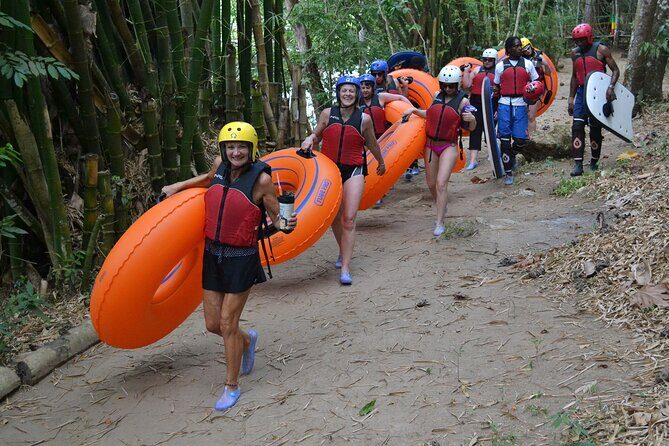 Falmouth Waterfalls River Tubing and Beach Adventure - Tubing the Rio Bueno: rapids, jungle views, and that cold-water reality