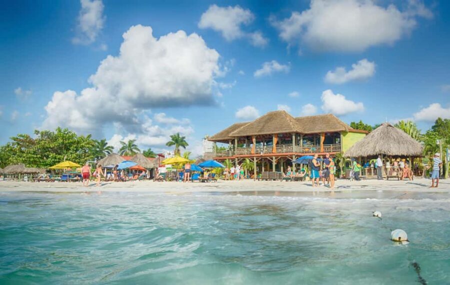 From Montego Bay: Negril Beach & Rick's Cafe Sunset Day Trip - Margaritaville stop: an easy beach break with real convenience
