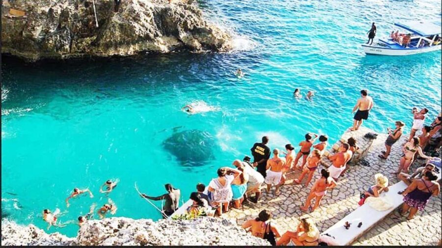 From Montego Bay: Negril Day Trip and Rick's Café Sunset - The Negril block: Seven Mile Beach time you can actually use