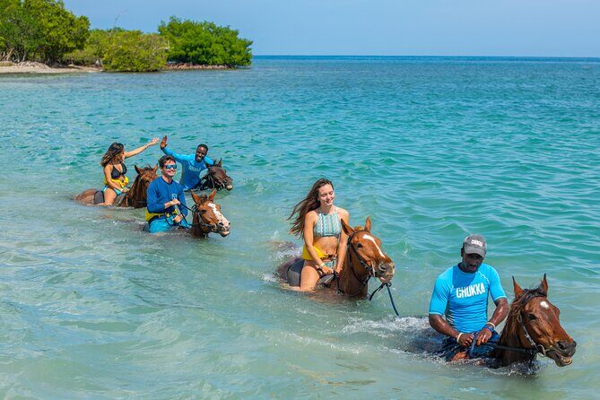 Jamaica All-Access Adventure Pass at Ocean Outpost - Party Catamaran Cruise: Music, Rum Punch, and Water Time