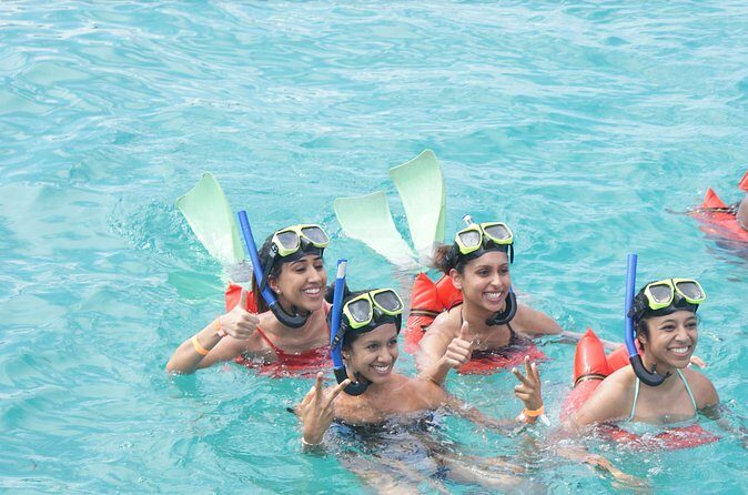 Jamaica Dunn's River Falls Party Cruise with Snorkeling - Snorkeling at the Reef Stop: Swim Time, Gear Included