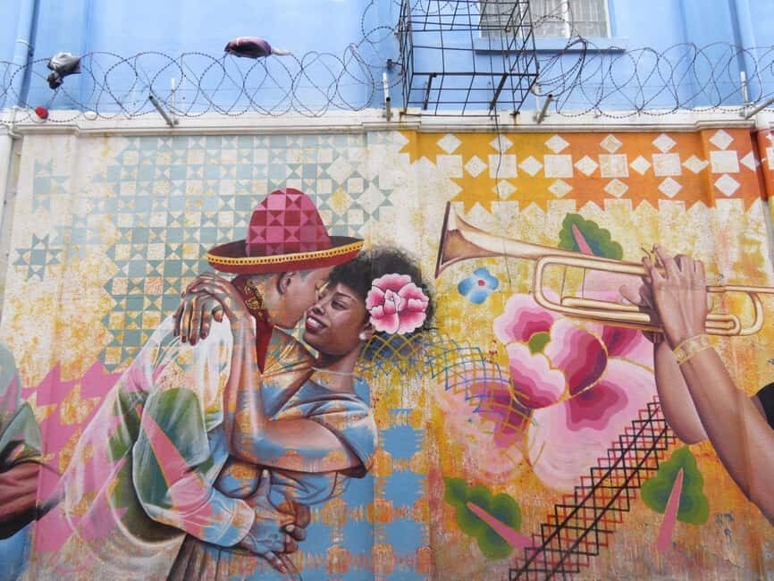 Kingston: Walking Tour with Mural Exploration - Institute of Jamaica connection: turning mural meaning into historical context