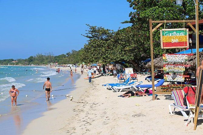Negril 7 Mile Beach & Rick's Café Combo Tour from Montego Bay - Seven Mile Beach Time: Swimming, Massage, and Optional Lunch Plans