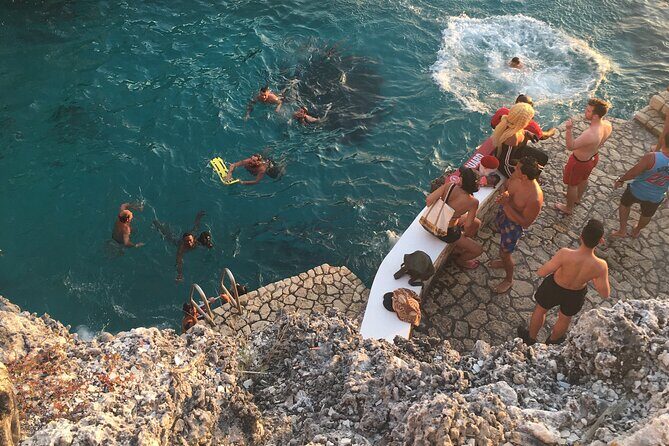 Negril Seven Miles Beach, Snorkeling, Boat Ride, Ricks Cafe Combo - Rick’s Cafe Sunset: Cliff Jumping, Music, and the Big Finish
